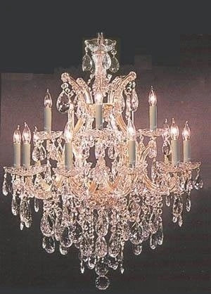 Crystal chandelier with multiple lights on a dark background